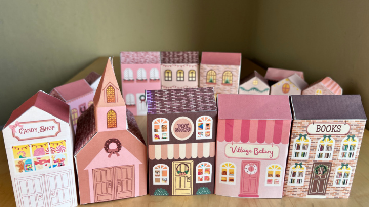 Printable Paper Christmas Village Image: 16 colorful paper Christmas village houses