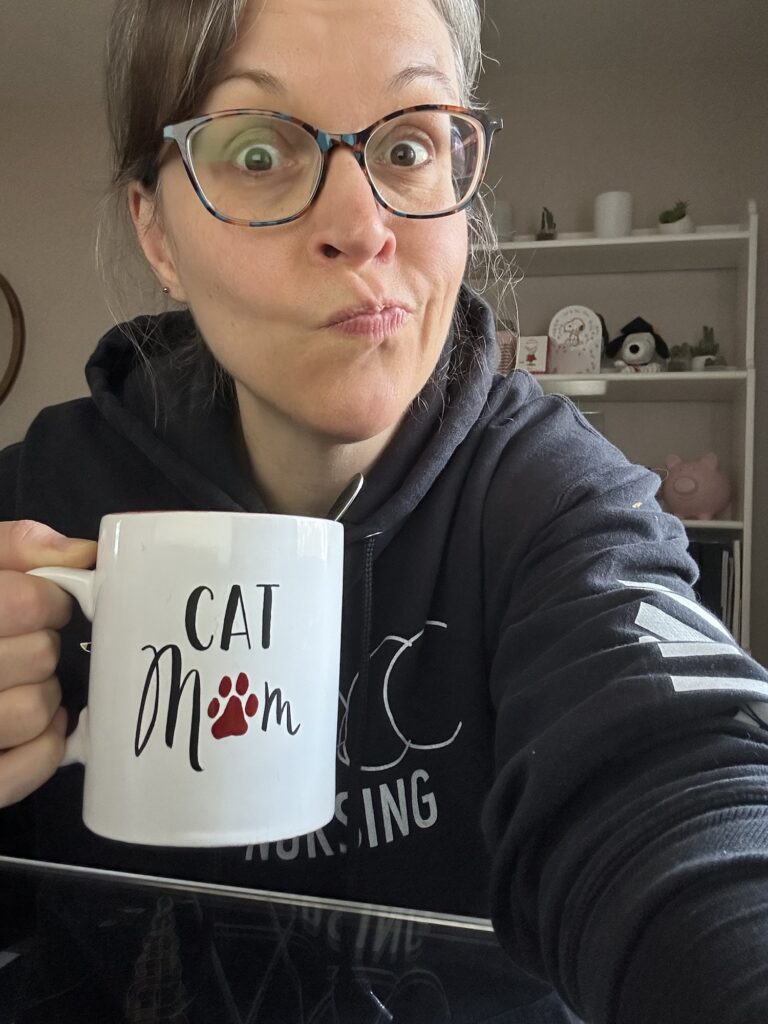 Thankful Thursday | On Thanksgiving Day Kriste holding a mug.